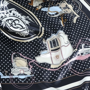 Classic black and gold carriage print silk scarf with polka dots and satin finish