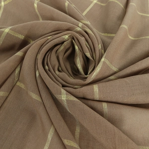 Brown checkered scarf with gold metallic threads in a spiral fold presentation