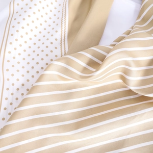 Elegant black and white stripe polka dot silk scarf with luxurious satin sheen drape