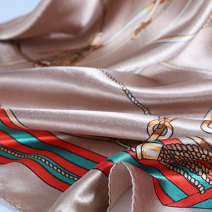 Luxurious satin square scarf featuring golden chain print and red green stripe border