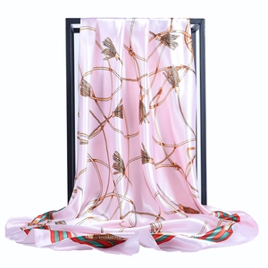 Pink satin square scarf with elegant gold chain print and classic striped borders