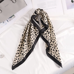 Elegant 70cm square silk scarf with black dalmatian leopard print and contrast border