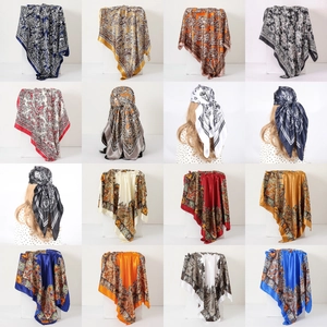 Detailed 4x4 grid showcasing sixteen colorful 90cm paisley print satin silk scarves