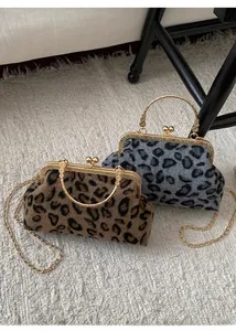 Detail view of leopard print plush handbags with vintage metal clasp and gold chain