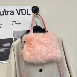 Pink faux fur handbag with leather handle and detachable strap for autumn winter style