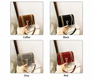 Detail showing leopard print crossbody bags in brown, black, grey and red colors