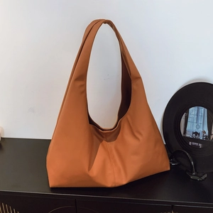 Minimalist large capacity caramel faux leather tote bag with wide shoulder strap