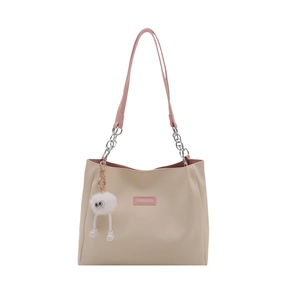 Large beige tote bag with pink straps, chain link detail and plush charm for travel