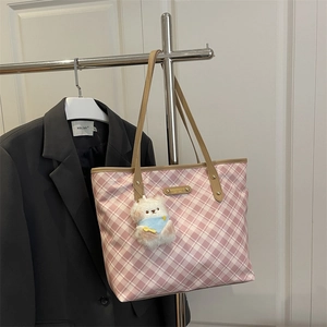 Pink checkered large tote bag with bear charm and leather handles for commute