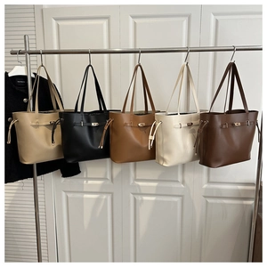 Classic minimalist bucket bags in five colors featuring elegant metal twist lock closure