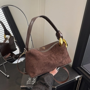 Brown matte suede Boston handbag with vintage design and elegant gold hardware handles