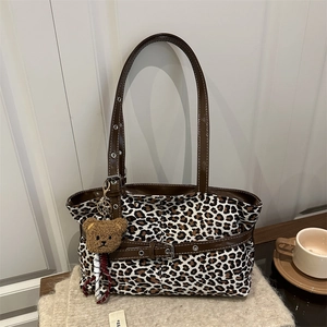 Retro leopard print suede tote bag with brown leather straps and plush bear charm