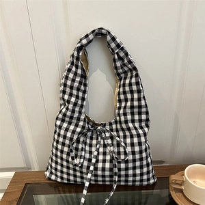 Minimalist black and white gingham tote bag with a decorative bow for women
