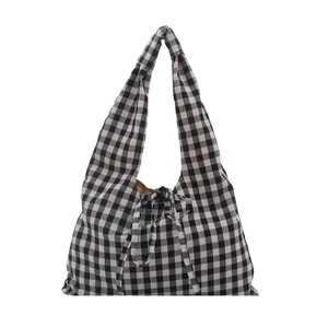 Minimalist black and white plaid canvas tote bag with bow tie closure and wide straps