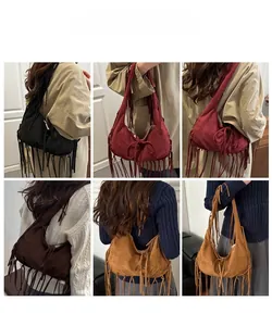Detailed model views of bohemian suede tote bags with long tassels in four vintage colors