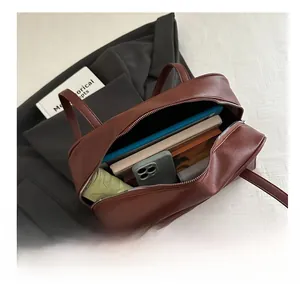 Detailed top view showing the large interior capacity of the brown PU vintage handbag