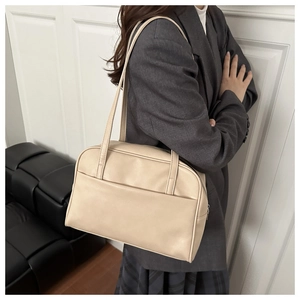 Beige PU leather hobo bag shoulder view showing minimalist design and spacious structure