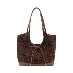 Fashionable leopard print tote bag with bow detail and durable synthetic leather handles