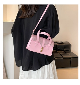 Fashionable pink PU leather handbag featuring sequined patchwork and adjustable shoulder strap