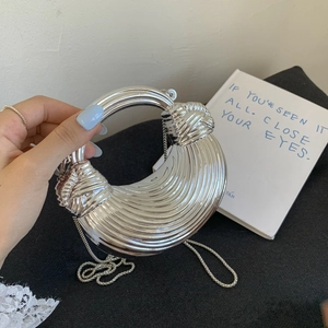 Silver metallic crescent bag with acrylic chain and industrial knot handle