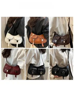 Detailed multi-color display of vintage oil wax leather crescent shoulder bags for women