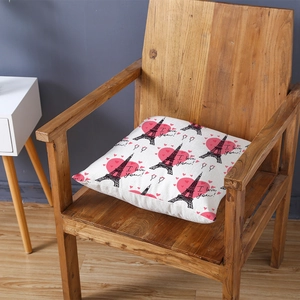 Romantic Eiffel Tower peach skin pillow cover with I love you print on a wooden chair