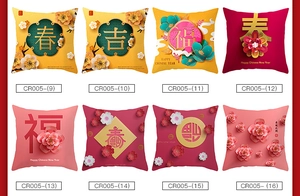 Close-up of eight Chinese New Year pillow covers with festive red floral and folk patterns
