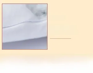 Detail of the soft pillowcase showing high-quality handmade edge stitching craftsmanship