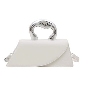 Modern white asymmetrical leather handbag with a silver sculptural metal handle