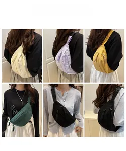 Multiple views of various colored corduroy chest bags worn by models in different styles