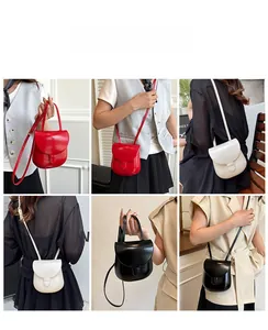 Detailed view of minimalist shell bags in red, white, and black colors on models