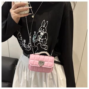 Pink quilted mini bag with pearl handle and silver metal chain strap detail