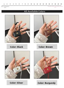 Mini leather pouch charms in black, coffee, silver, and burgundy with measurement ruler