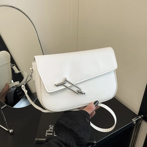 Minimalist white leather shoulder bag with stylish silver metal buckle for women