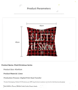 Detail of red and black plaid Christmas pillow cover featuring white LET IT SNOW text