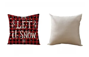 Detail of red and black buffalo plaid pillow cover with Let It Snow print and beige back