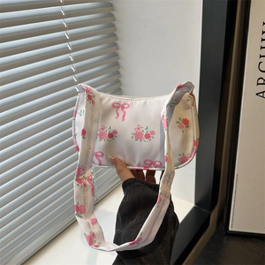 Floral print shoulder bag with pink roses and ribbon bow design for women