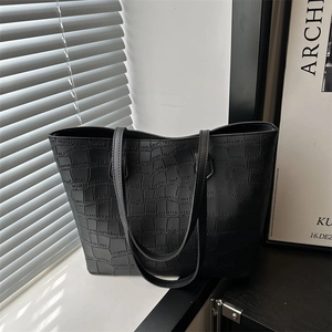 Chic black crocodile embossed tote bag for women with dual straps and large capacity