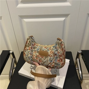 Borsa a spalla vintage a fiori con profili in pelle e tracolla a catena in metallo