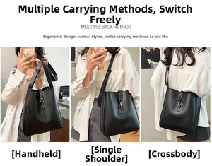 Three-way carry black leather bucket bag with gold buckle for hand, shoulder or crossbody use