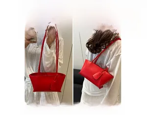 Red fashion handbag shown in handheld and shoulder bag styles for versatile wear