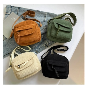 Detail of corduroy crossbody bag texture and woven rope zipper in four colors