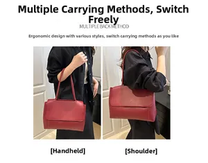 Detail of red leather tote bag showing dual carrying styles as handbag and shoulder bag