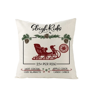 Federa natalizia con slitta rossa e pigne su tessuto di lino beige per decorazione