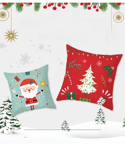 Detail of peach skin fabric Christmas pillowcases with Santa and tree patterns