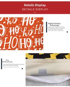 Detail of festive orange pillow cover with digital HO HO HO print and fine seam stitching