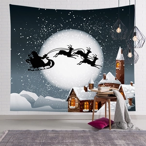 Christmas tapestry featuring Santa on a reindeer sleigh over a snowy mountain and cabin