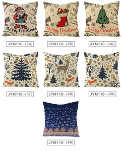Detailed view of Christmas pillow covers featuring festive patterns on linen texture