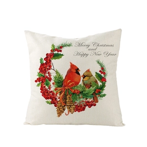 Nordic Christmas pillow case featuring red birds and holly wreath on beige fabric