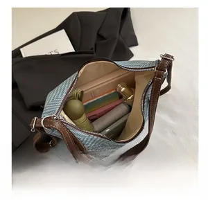 Macro shot of large capacity woven tote bag interior showing daily storage space